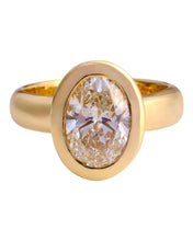 Load image into Gallery viewer, Gold ring with a diamond on a white background