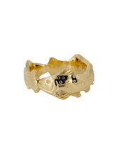 Load image into Gallery viewer, A gold ring featuring three hand engraved trout designs encircling the band.