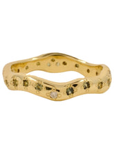 Load image into Gallery viewer, An organic shaped gold band ring set with multiple round natural Australian parti sapphires and one natural diamond.