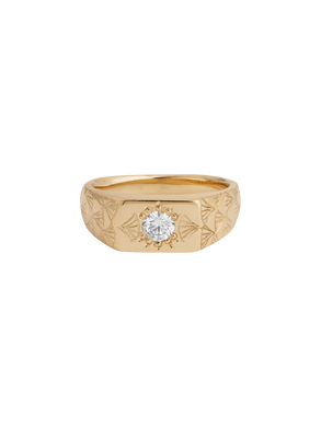 A yellow gold band ring with a single central diamond, featuring hand-engraved fan motifs on the band and face.